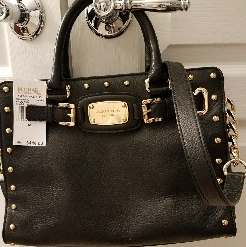 Michael Kors handbag with original price tag